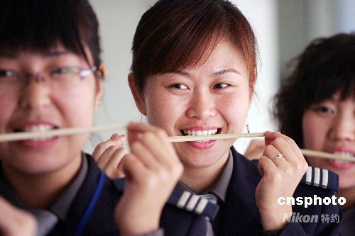 chopstick smile training for Olympic Game