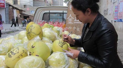 painting on grapefruit for better sales