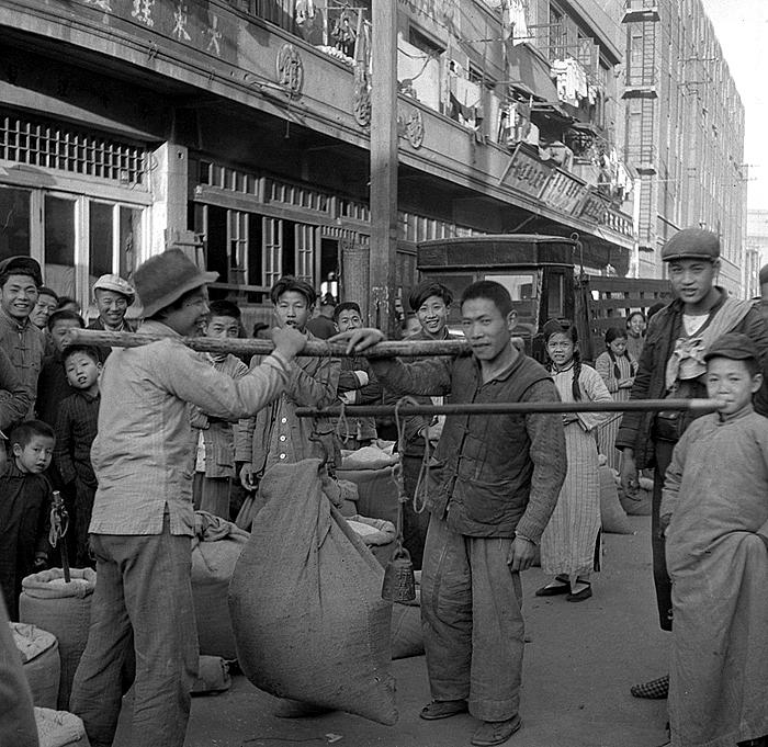 shanghai old picture, people's life, weighing rice