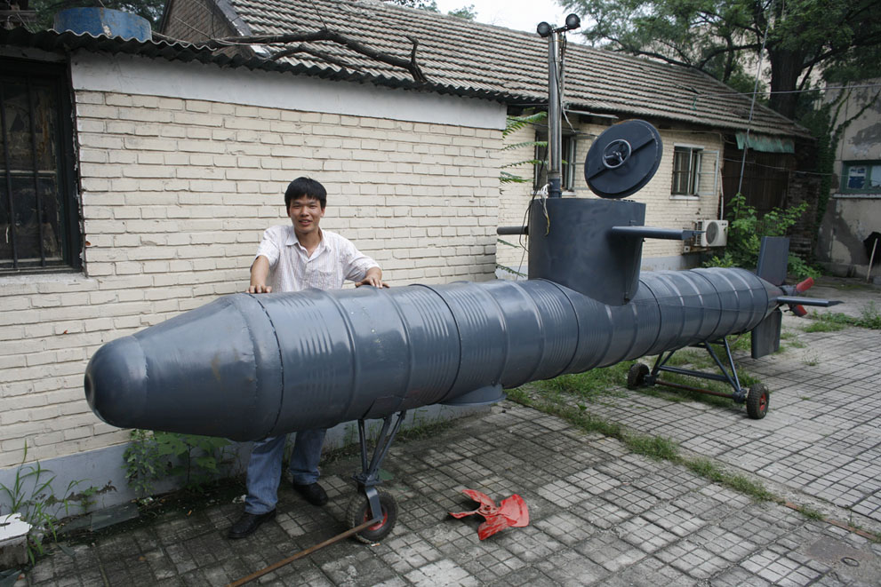 a homemade submarine made from old oil barrels