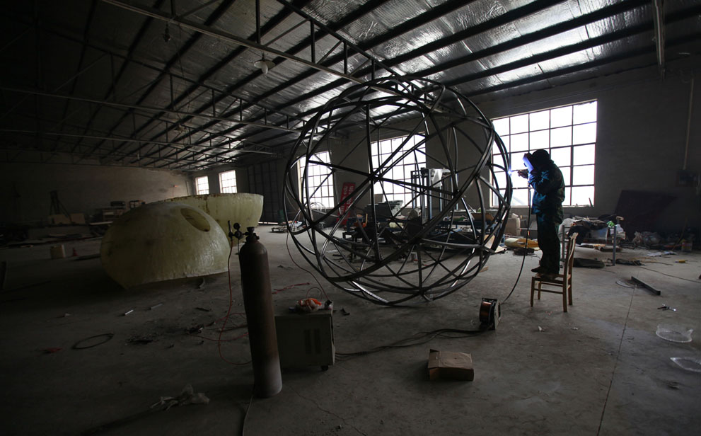 worker is working in a workshop for Noah's Ark