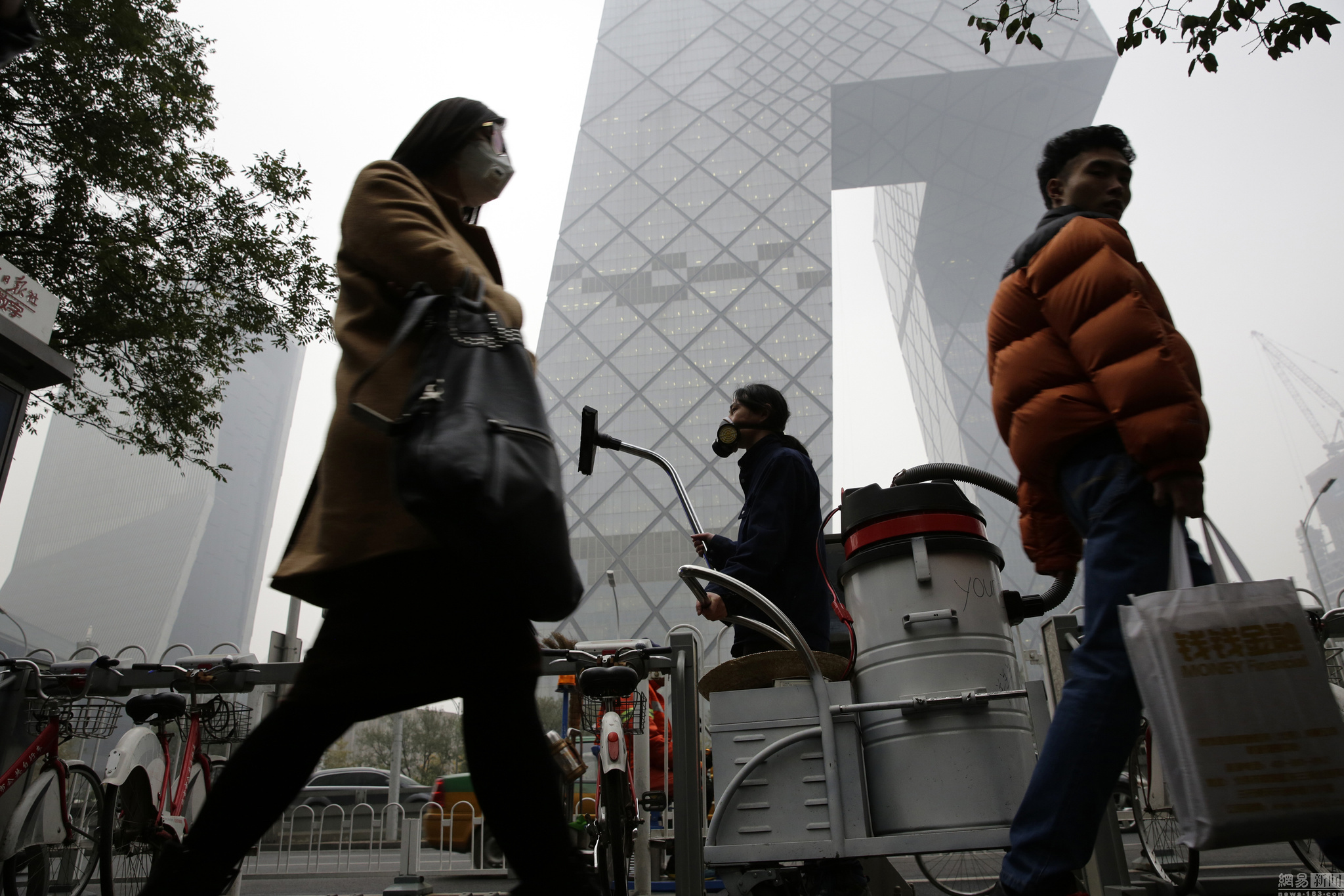 Performance Art Piece: Dust Vacuumed From Beijing Air, working at CCTV building