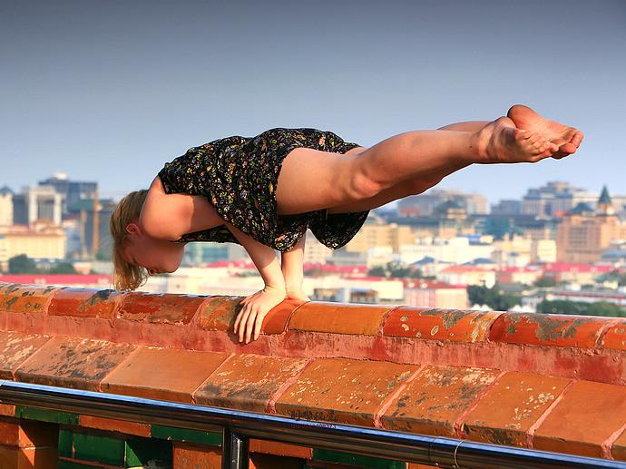 balance and strenght in a park outside the forbidden city