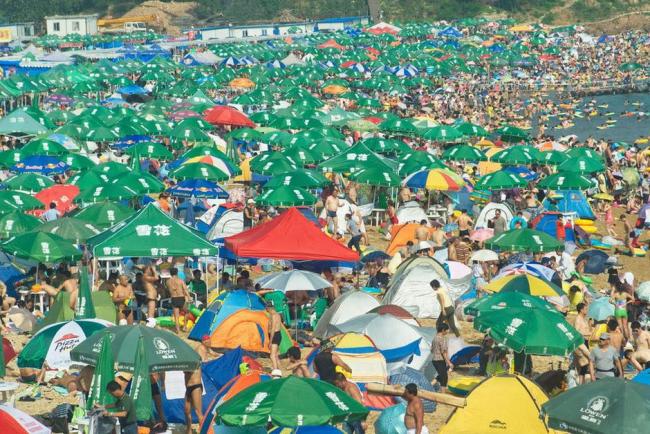 crowded beach in dalian