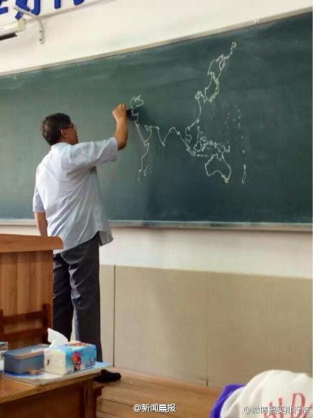 hand drawn world map with chack on black board