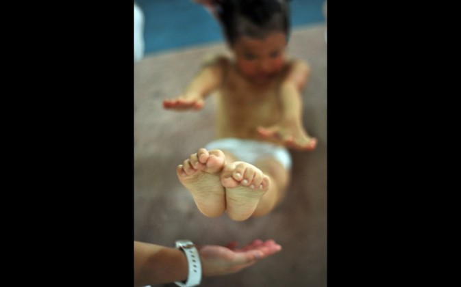 gymnasts training from very young age for god