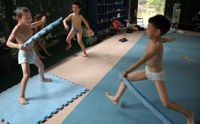 china young gymnasts training, play duringn the training break